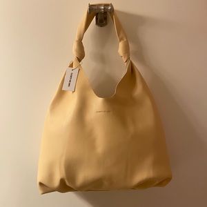 Knitted soft hobo hand bag w/ removable coin pouch. Never used